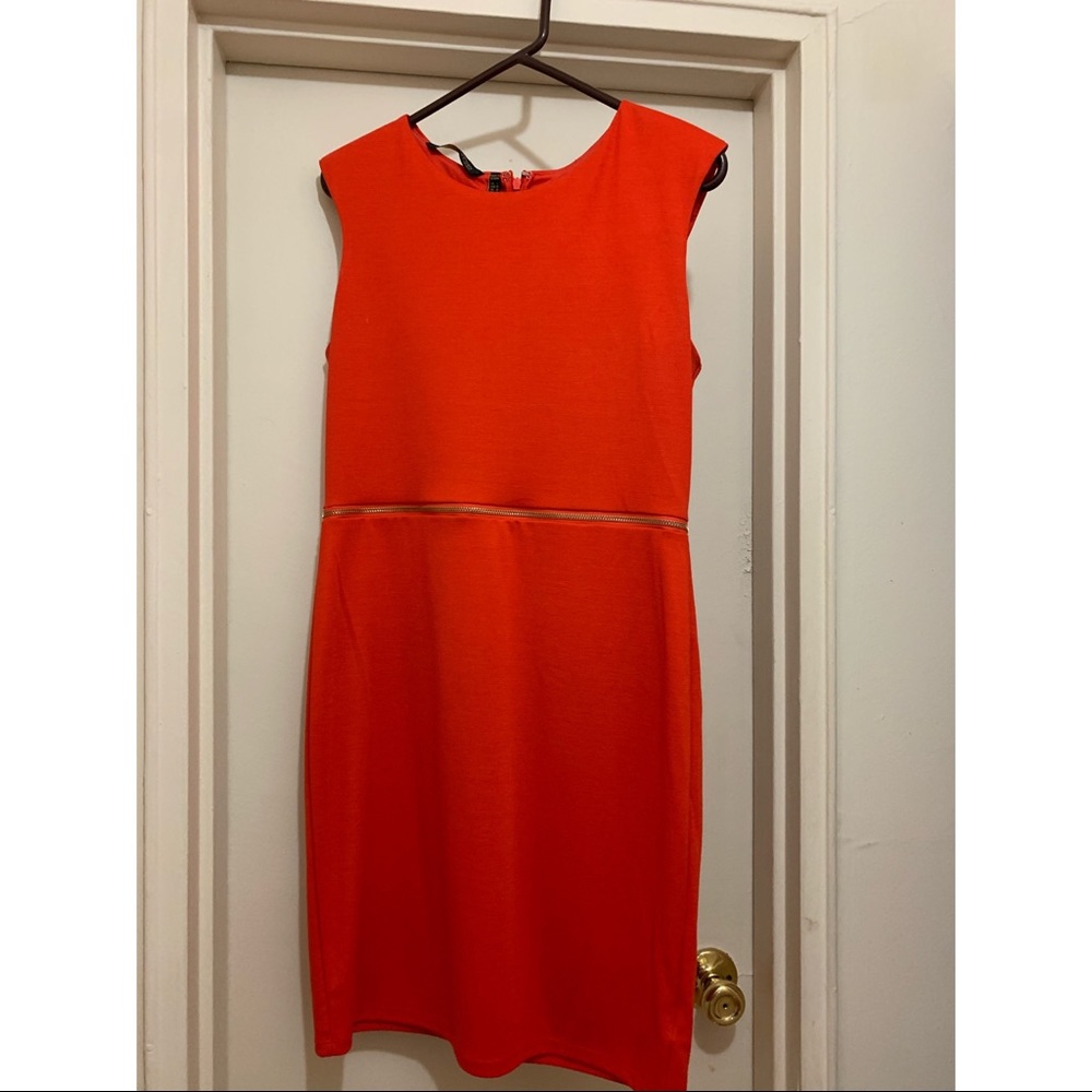 orange kardashian kollection dress.